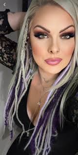 Viking-inspired braids and dreadlock extensions for October wedding