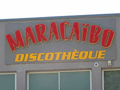 A nightclub that features dancing to recorded or sometimes live music and often has showy decor and elaborate lighting. Discotheque Meaning In English