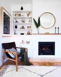 Maddy Evennett On Instagram The Living Room Shelves Are A Big Focal Point In Our Small Living Room Shelves Brown Living Room Decor Living Room With Fireplace