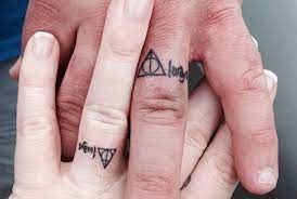 Magical Harry Potter Inspired Couples Tattoos For You And Your Forever Muggle Obsev Wedding Band Tattoo Tattoo Wedding Rings Wedding Tattoos