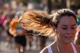 See runners competing in the 2022 Cap10K race in Austin