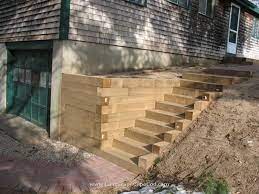 Love This Might Be A Good Idea If We Need To Replace The Cross Ties We Already Have Landscape Timbers Landscape Stairs Landscaping Retaining Walls