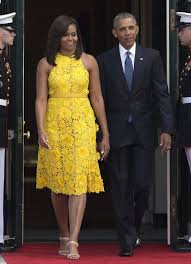 First Lady Michelle Obama Wears Yellow Naeem Khan Floral Embroidered Dress To Welcome Sing Michelle Obama Fashion Latest African Fashion Dresses Michelle Obama
