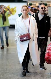 Marion Cotillard Does Airport Dress With French Flair In Milan Vogue Preparing for a phone call with marion cotillard is a multimedia experience.