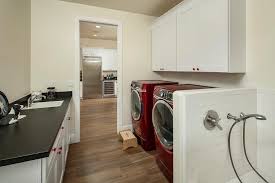 Washing machine pedestals and dryer pedestals raise the machines to a comfortable height and washing machine stands, or laundry pedestals, raise washers and dryers by approximately a foot for. Countertop Over Washer Dryer Design Ideas