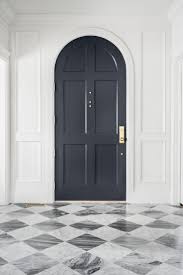 Front Door Design Foyer Design Navy Blue Door Arched Door Checkered Flooring Distressed Checkered Til Foyer Design Arched Interior Doors Arched Doors