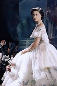 Princess Margaret Wedding Dress Tiaras Family Photos Images Tatler A huge fan of dior's new look, the royal rebel dressed in contrast to her prim elder sister and favored a bold variety of accessories—from glamorous sunglasses to bright headscarves. princess margaret wedding dress