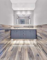 Artistic tile brand products are carried by artistic tile showrooms and authorized dealers nationwide. Artistic Tile I Our Wood Look Kauri Plank In Tasman Blue Adds Refinement And Warmth To This Upper East Side Ny House Flooring Home Refinishing Hardwood Floors
