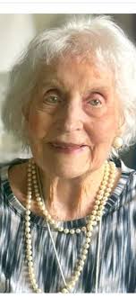 Adjusting a photo to make a face clearer for a funeral