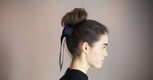 (no ponytail holder needed) 2) insert pin up through the outside of your bun. Gif Tutorial How To Create A Ribbon Bun