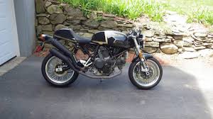 The sport1000 was available in black with a white stripe, red with a white stripe, or amber with a black stripe. 1 Of 100 2007 Ducati Sport 1000 Special Edition Bike Urious