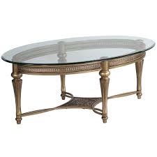Each have beveled mirror glass table top and are accented with silver hardware. Magnussen Home Galloway Glass Oval Cocktail Table W Glass Top 37526 Bellacor