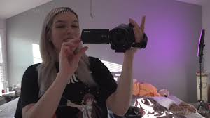 Eevie films herself.