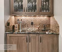 Wet bar ideas should swirl in your head when you see one like this. Wet Bar Cabinets Omega Cabinetry