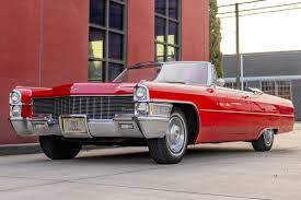Image result for Claret Maroon 1965 Cadillac
