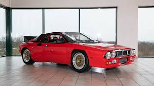 The prototypes are barely disguised, but some finer details like the lights are camouflaged by stickers. Lancia 037 Prototype Number One Up For Auction Autoblog