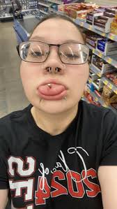 What are some tips for tongue piercing aftercare and pain management?
