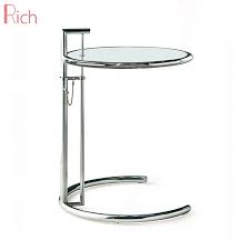 The result made a remarkable impression. Modern Home Furniture Round Top Tempered Glass Table Adjustable Eileen Gray Side Table Buy Table Coffee Table Living Room Furniture Product On Alibaba Com