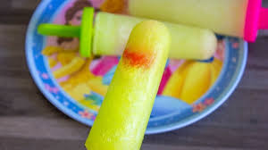 homemade midori sour flavored popsicles