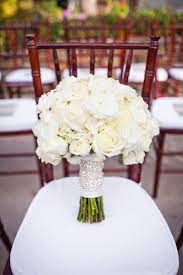 With over 10 years of industry experience, sara knows what it takes to make arrangements memorable. Gorgeous White Rose Bouquet Flower Centerpieces Wedding Wedding Flower Arrangements Wedding Bouquets