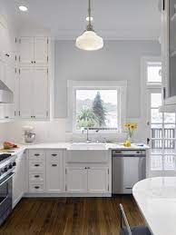 Sep 21, 2020 · pinch this kitchen paint idea and paint your cabinets two different colours, (you could even add another colour for the kickback). Pin By Sandy Dunn On White Kitchen Cabinets Gray Tile Floors Grey Kitchen Walls Kitchen Grey Walls Bungalow Kitchen