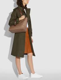 The amount of time you'll need. Signature Chain Convertible Tote In Signature Canvas