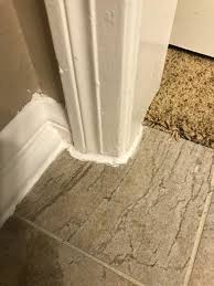 Caulking base to a tile floor is a good thing. How Do I Repair Caulk Between The Floor Tile And The Baseboard Hometalk