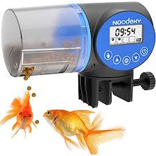 Folks got some fish for the house. Amazon Com Noodoky Automatic Fish Feeder Moisture Proof Electric Auto Fish Food Feeder Timer Dispenser For Aquarium Or Small Fish Turtle Tank Auto Feeding On Vacation Or Holidays Kitchen Dining