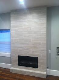 Because the homeowner was looking for a tiled or stone clad fireplace for a bigger statement, we would have run into a problem with the stone at the top of the fireplace. Fireplace Tile Wood Tile Fireplace Fireplace Remodel