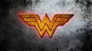 wonder woman golden logo wallpaper comic wallpapers 50697 wonder woman golden logo wallpaper