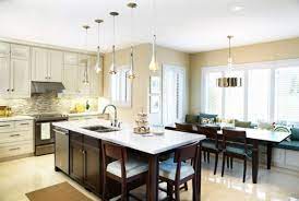 These kitchen island tables allow for more seating room, creating a casual space for dining within one of the most popular rooms in many homes. 30 Kitchen Islands With Tables A Simple But Very Clever Combo Kitchen Island Table Kitchen Island With Sink Modern Kitchen Island