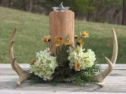 Pin By Cassandra Caliman On Deer Antlers Camo Wedding Centerpieces Camo Wedding Decorations Wedding Centerpieces