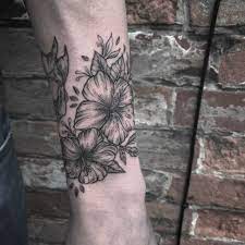 Wrapping Blackwork Hibiscus Tattoo Wrapped Around The Left Forearm Hibiscus Tattoo Tattoos Flower Tattoos