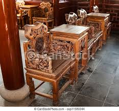 This handcrafted chair & coffee table set will make a statement about your taste and will add a unique indian touch to your living room. Carved Wooden Chairs And Table Beautiful Chinese Antique Carved Chair With A Table Canstock
