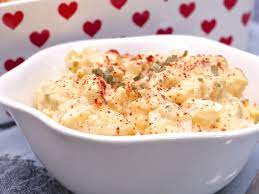 A syrup mixture is drizzled over the top as a glaze. Southern Crowd Pleasing Potato Salad Recipe