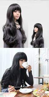 What makes a blunt haircut even more sleek and stylish? Thick Long Hair And Straight Bangs That Frame The Face Hairstyles With Bangs Long Hair Styles Hair Styles