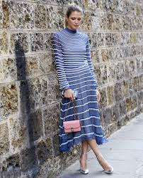 Saw something that caught your attention? Brazilian Style Blogger Helena Bordon In Blue And White Striped Dress About Her