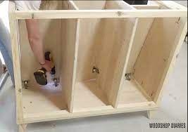 This video shows to make a 3 bin laundry hamper cabinet. Diy Tilt Out Laundry Hamper Cabinet Free Building Plans And Video
