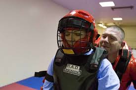 Pvt. Lauren Williams, (left) a Soldier assigned to