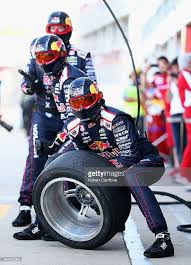 The Red Bull Racing Australia Pit Crew Prepare For A Pit Stop During Super Cars Classic Racing Cars Red Bull Racing
