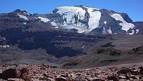 It lies on the border between argentina and chile, about 99 km (62 mi) east of santiago, chile, and immediately southwest of the massive cerro tupungato stratovolcano. Cerro El Plomo Alchetron The Free Social Encyclopedia