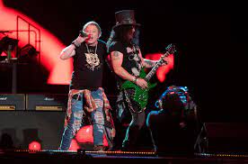 At the beginning of their career guns n' roses signed to geffen records and started producing music for them. Guns N Roses Debut Absurd During Fenway Park Show Billboard