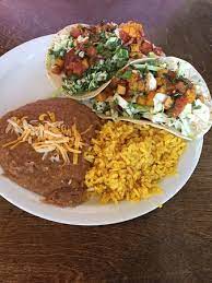 Rice is a mexican staple that pairs perfectly with fish tacos, especially if you're having guests over. Fish Tacos Beans And Rice Picture Of Nadine S Mexican Kitchen Rathdrum Tripadvisor