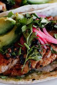 Many fish taco recipes use battered and fried fish (and usually a low quality farmed tilapia). Spicy Fish Tacos Christiann Koepke