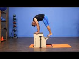side bend on pilates chair youtube pilates chair pilates workout workout moves