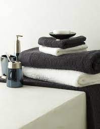 coordinate your bathroom towels and accessories bedbathntable toilet accessories set bathroom towels luxury bathroom tiles