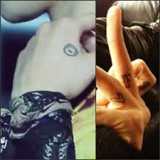 32 small tattoo ideas for women | crestfox. G Dragon S Tattoos On His Hand And Fingers I Really Like How Simple They Are G Dragon Tattoo Japanese Dragon Tattoo Meaning Dragon Tattoo