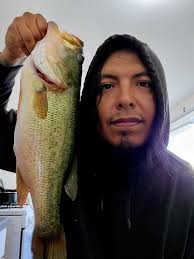 Caught bass with texas rigged yamamoto custom baby craw