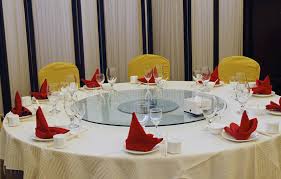 If they seat at either extreme of the table then it would be in the english way. Chinese Restaurant Table Vip Photos Free Royalty Free Stock Photos From Dreamstime