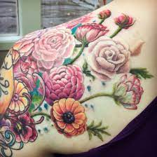 I Love This One It S A Larger Piece But This Is My Favorite Part So Many Pretty Flowers Roses Ranunculus And Posies Tattoos Beauty Tattoos Ribbon Tattoos